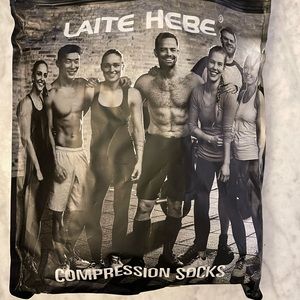 NEW Compression Socks.  5 pairs.   3 Nude and 2 black.